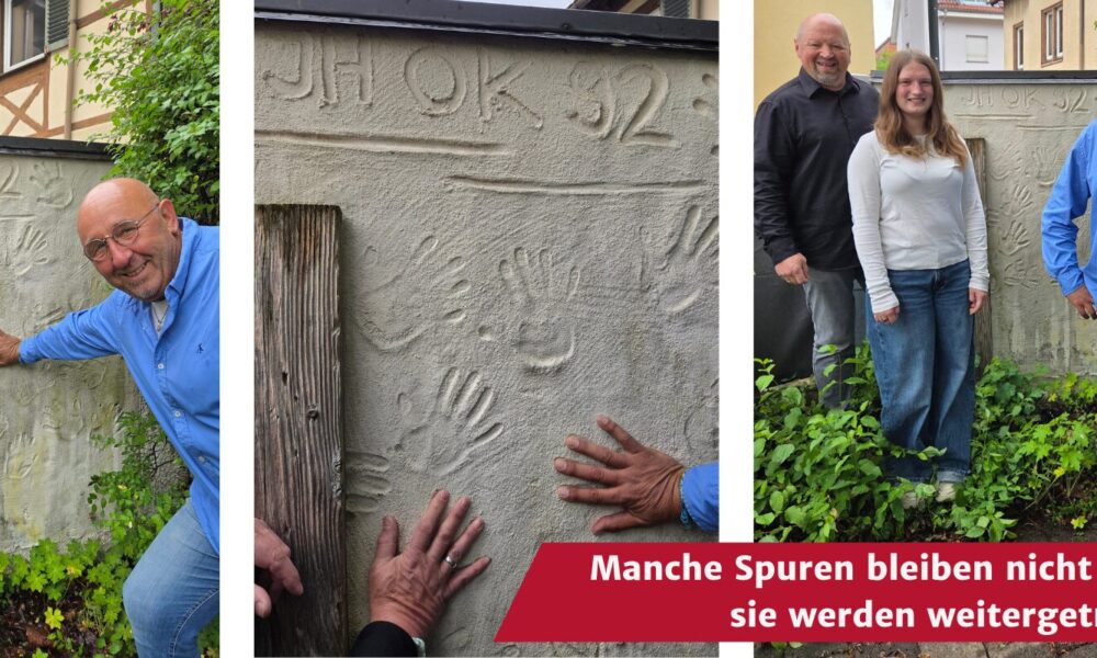 Ehemalige Schüler des Fachbereichs Jugend und Heimerziehung an ihrem Denkmal auf dem IfSB Schulgelände